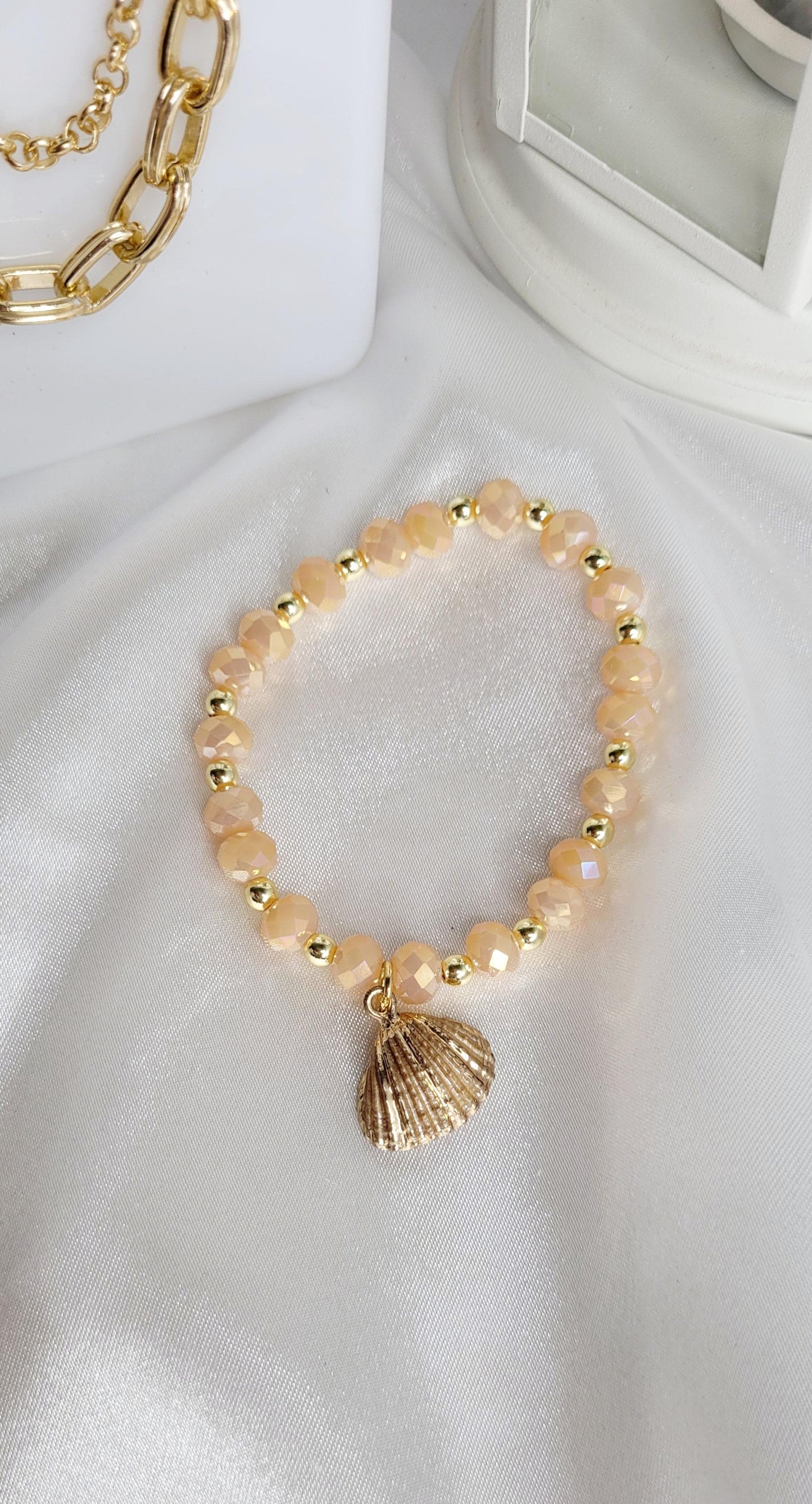 Conch and Beige Crystals Bracelets